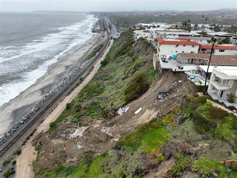 Jan 25, 2024 · Workers investigate a landslide below Buena Vista that damaged the pedestrian beach trail and stopped rail service between Orange and San Diego counties in San Clemente, CA, on Thursday, Jan. 25 ...